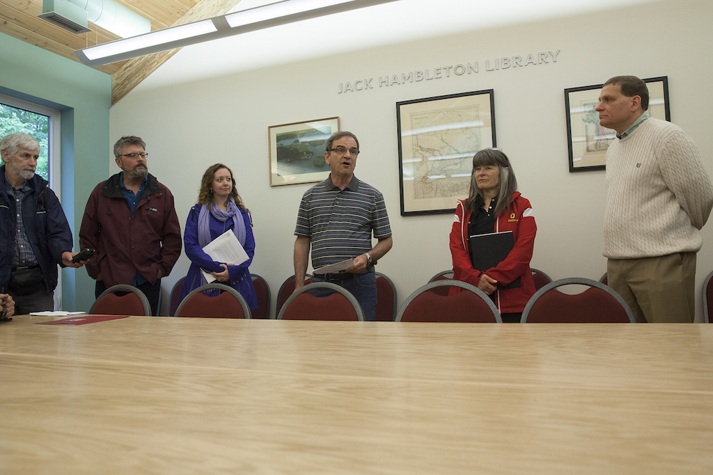 Speeches for the opening of the Jessie V. Deslauriers Centre for Biology. From left Douglas Farquhar (CFRC programmer and host), Steve Lougheed (QUBS Director), Lisa Sykes (Senior Development Officer, Faculty of Arts & Science), Tom Harris (VP Advancement), Sophie Kiwala (MPP Kingston & the Islands), and Daniel Woolf (Principal).